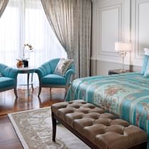 Comfy bed & couches in Premier Versace Room at Palazzo Versace