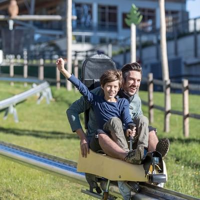 Toboggan run in Katschis Goldfahrt near Falkensteiner Hotels