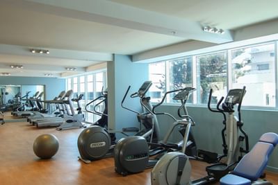 fitness center with cardio equipment