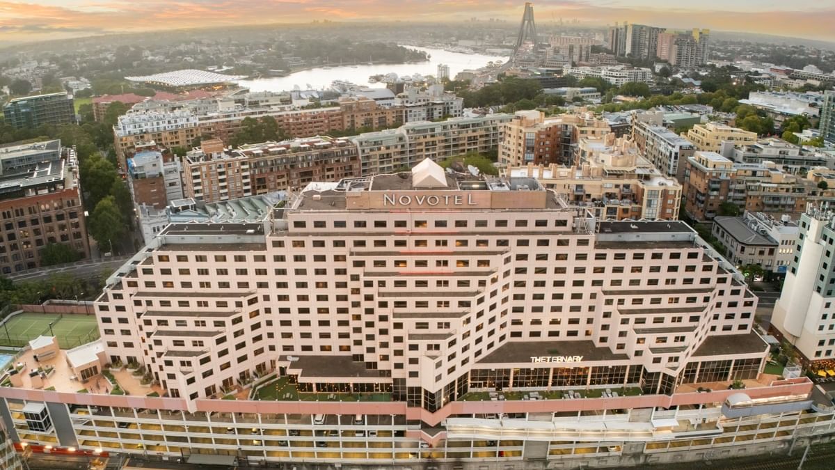 Novotel Sydney on Darling Harbour showing premium hotel exterior with urban surroundings
