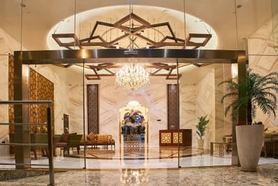 Exterior of an elegant entrance at Carlton Dubai Creek Hotel