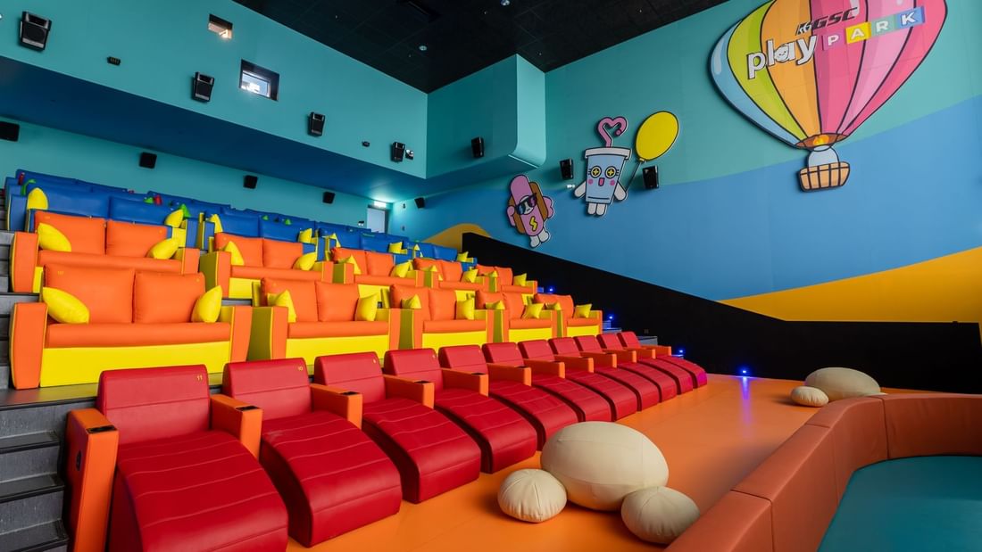 Children's play area with padded seats and cartoon wall decor in GSC near Sunway Hotel Big Box