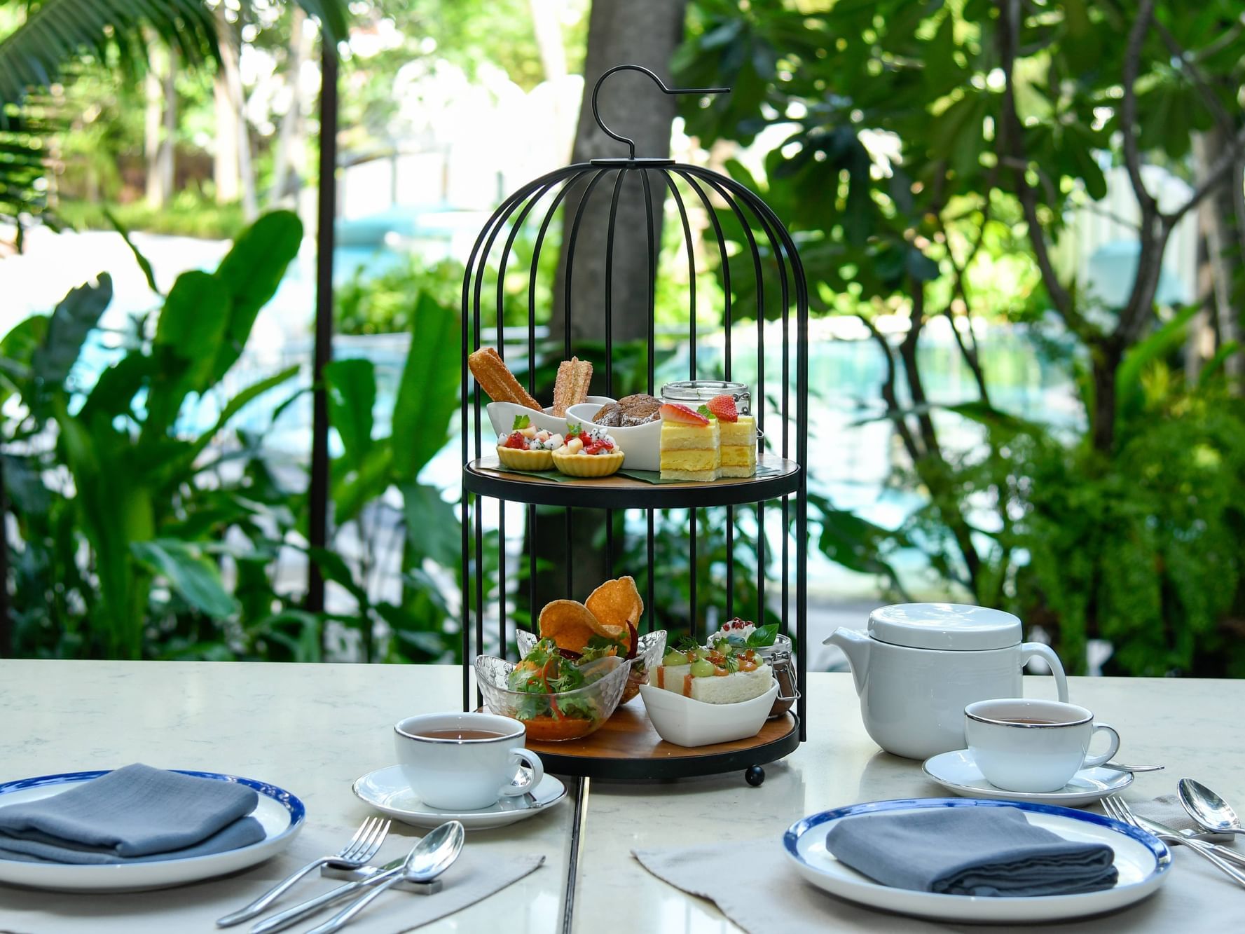 2-story platter & tea served at Chatrium Hotels & Residences