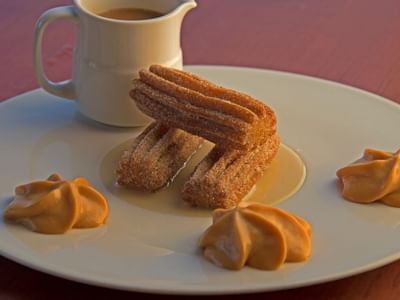 Close-up of cookies & tea served at Cala de Mar