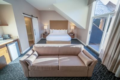 Sofa in the living room in King Suite at The Malcolm Hotel