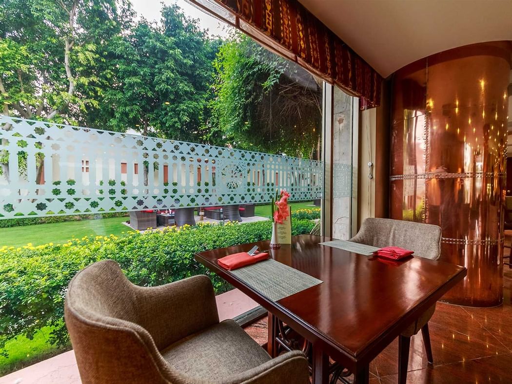 Dining table for two in Rakaposhi at Islamabad Serena Hotel