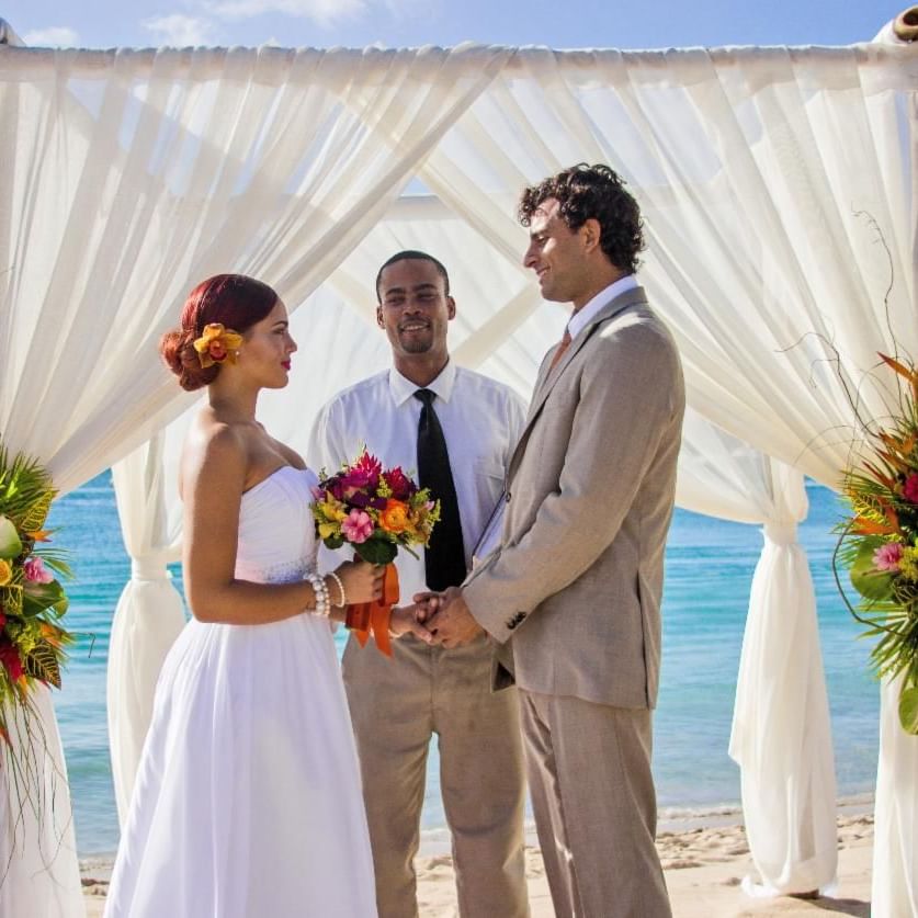 bride and groom married on beach
