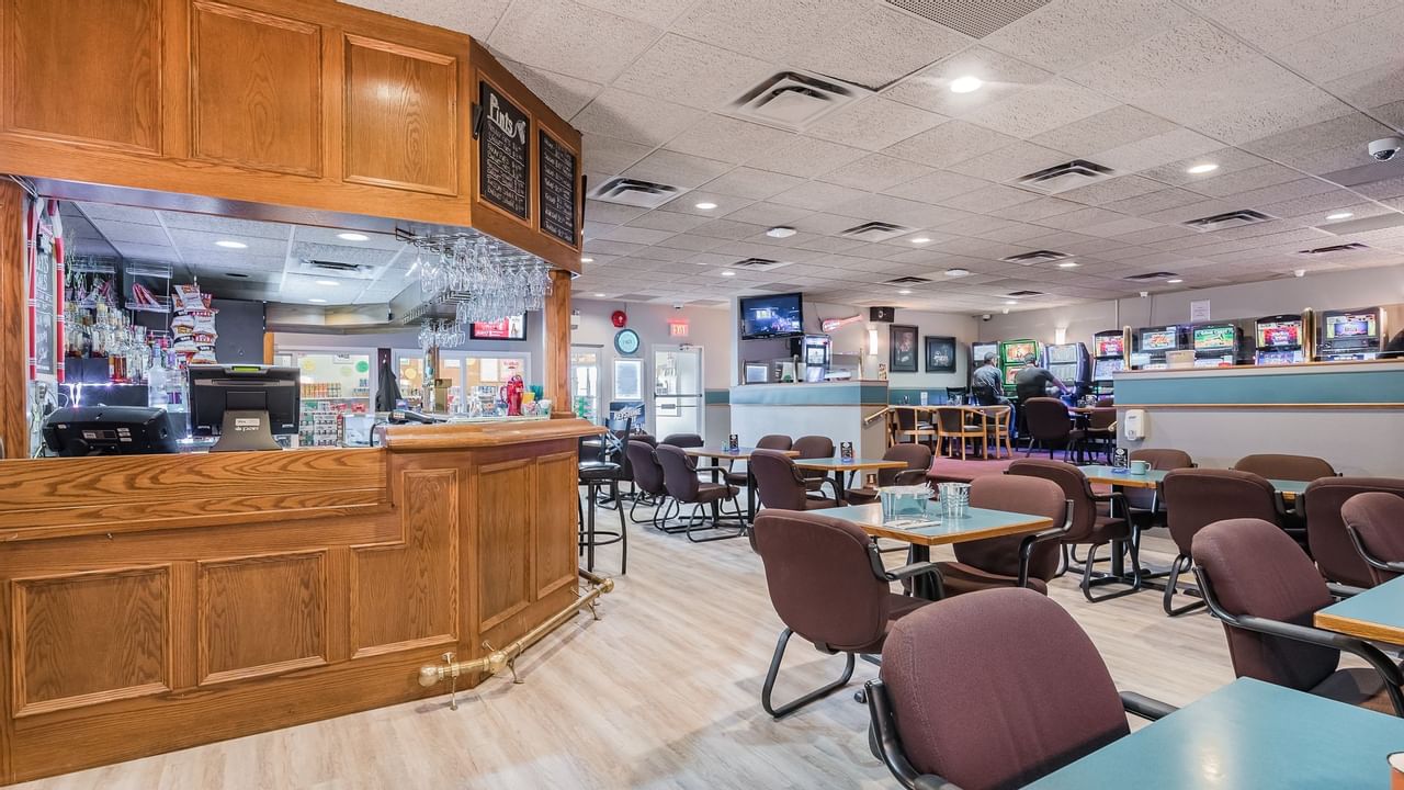 Dining tables and bar in restaurant