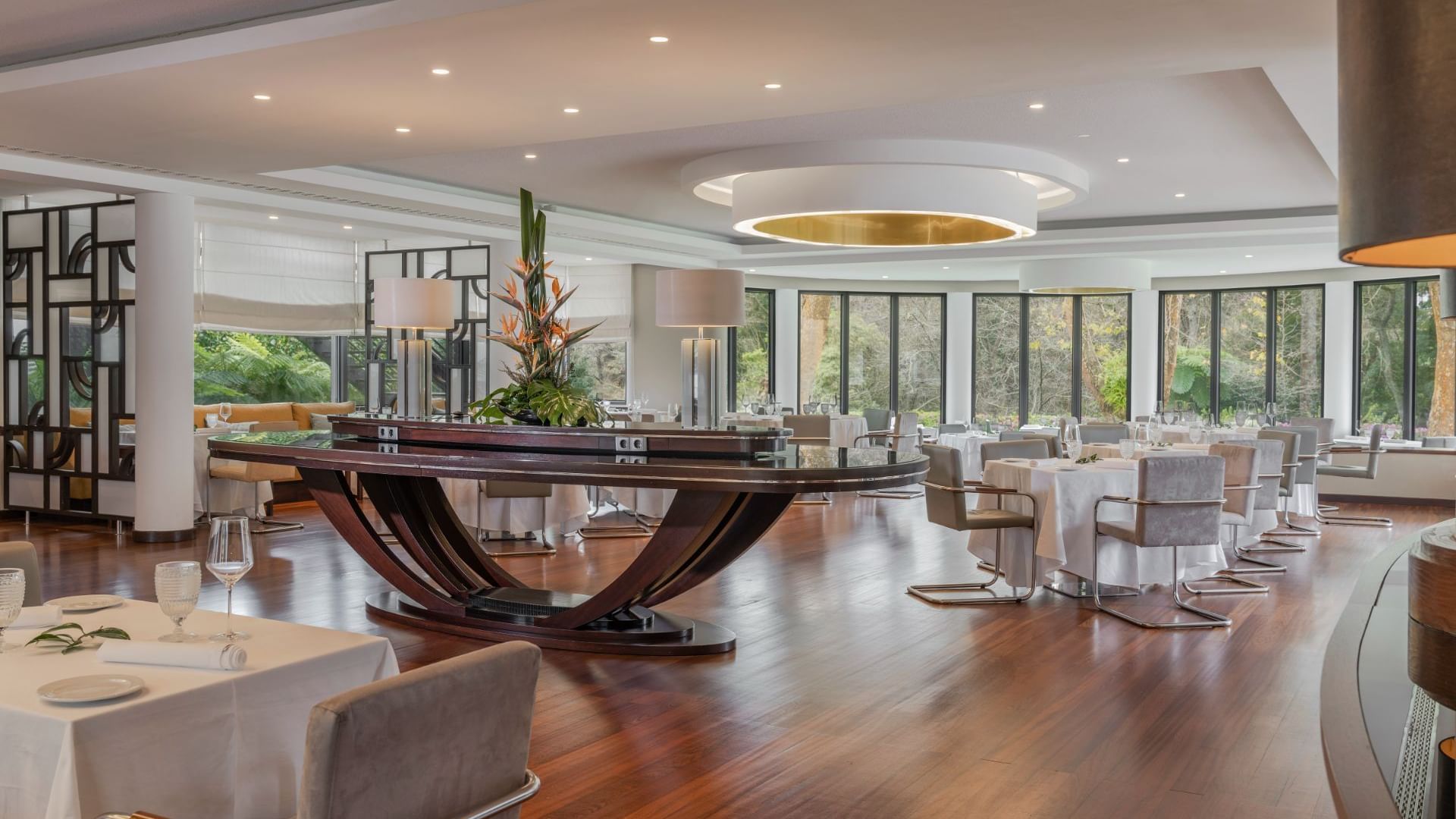 Dining tables of TN Restaurant with wooden interior at Terra Nostra Garden Hotel