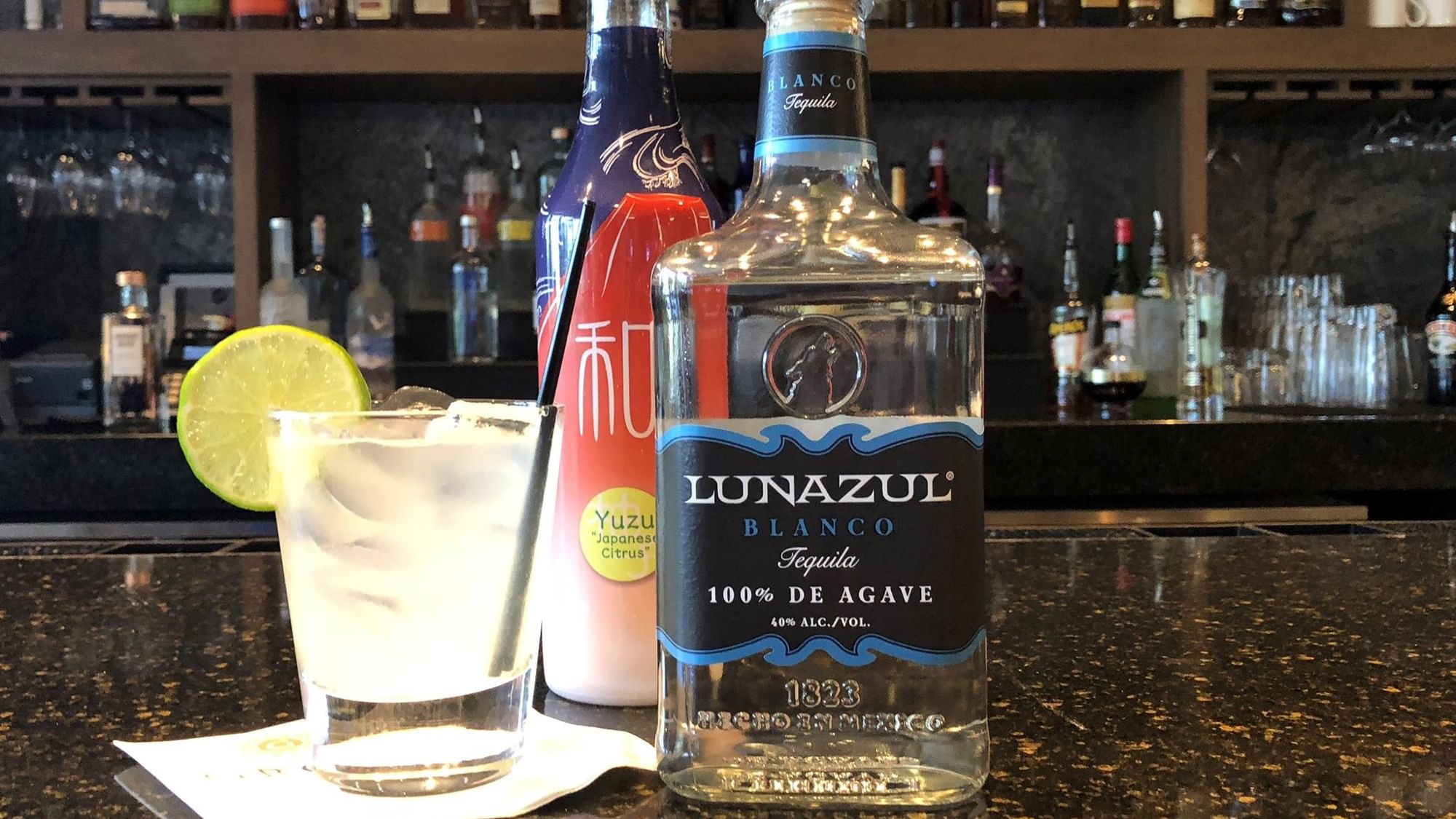Tequila bottle and a margarita at Cinco De Mayo event.