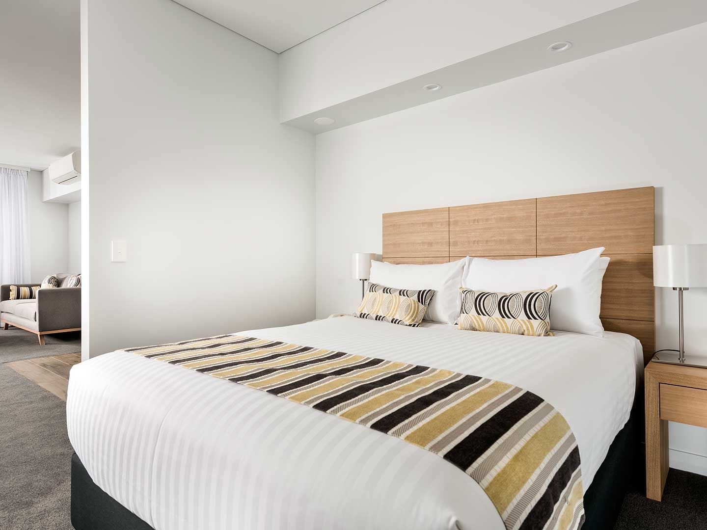 Bedroom with one bed in 1 Bedroom Ocean Sunrise apartment at Be Fremantle