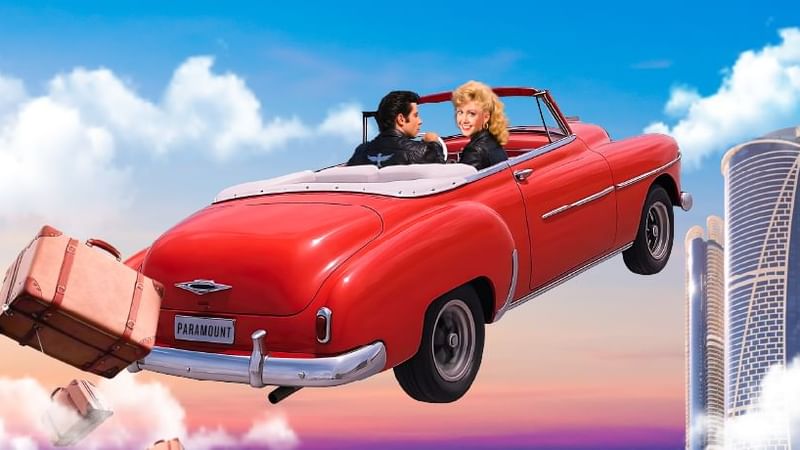 Illustration of the Grease movie characters flying in a red convertible at Paramount Hotel Midtown