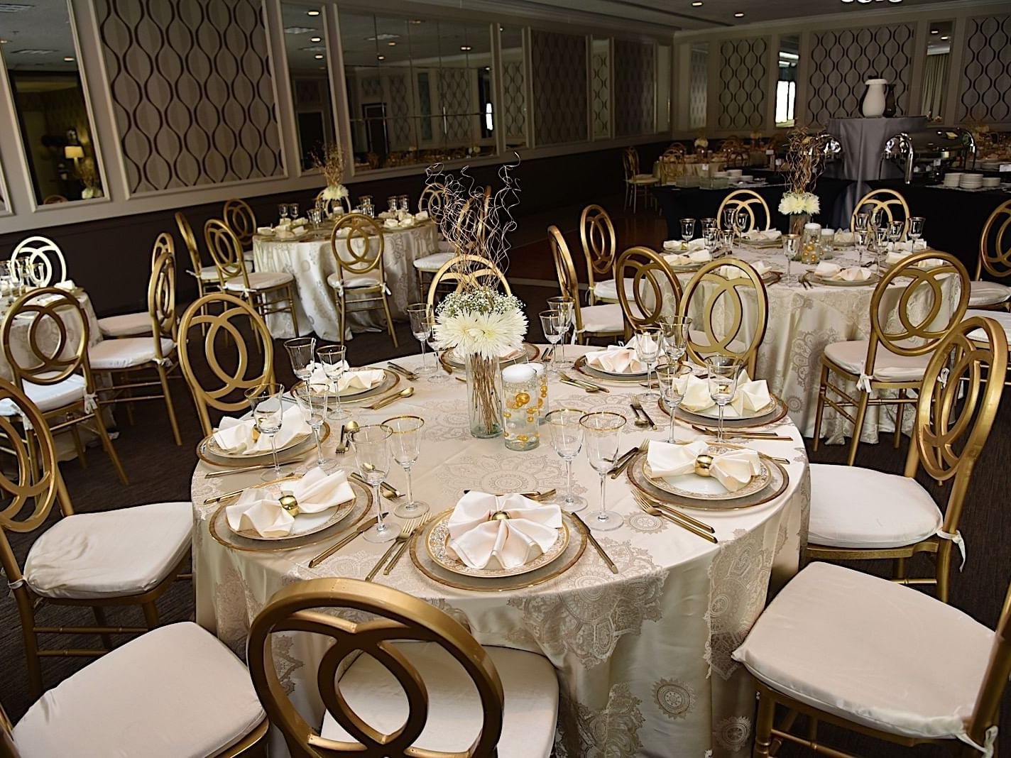 Tables arranged in Magnolia Ballroom at Capitol Skyline Hotel