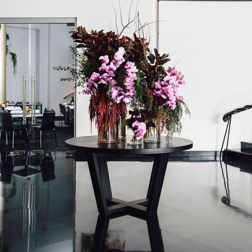 Flower vase on a table in the lobby at Como Hotel Melbourne