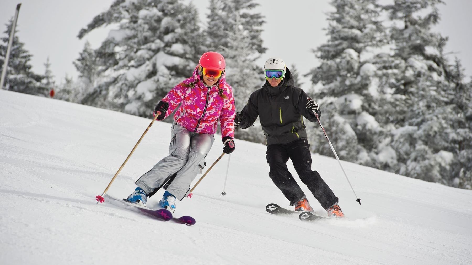 Skiers enjoying fresh snow at Stowe Mountain near Topnotch Resort in Vermont.