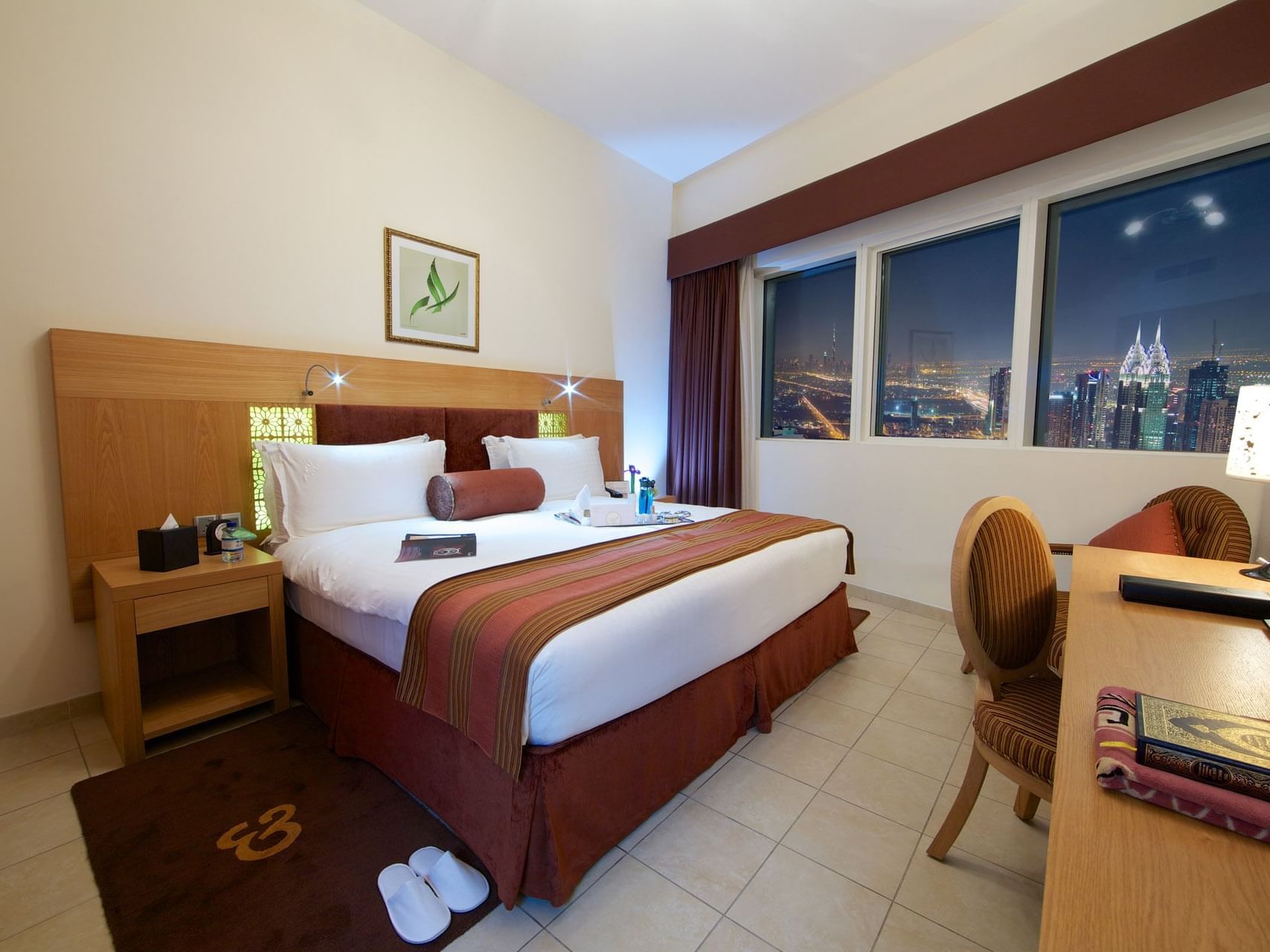 Interior of two bed room suite with bed at Tamani Marina Hotel