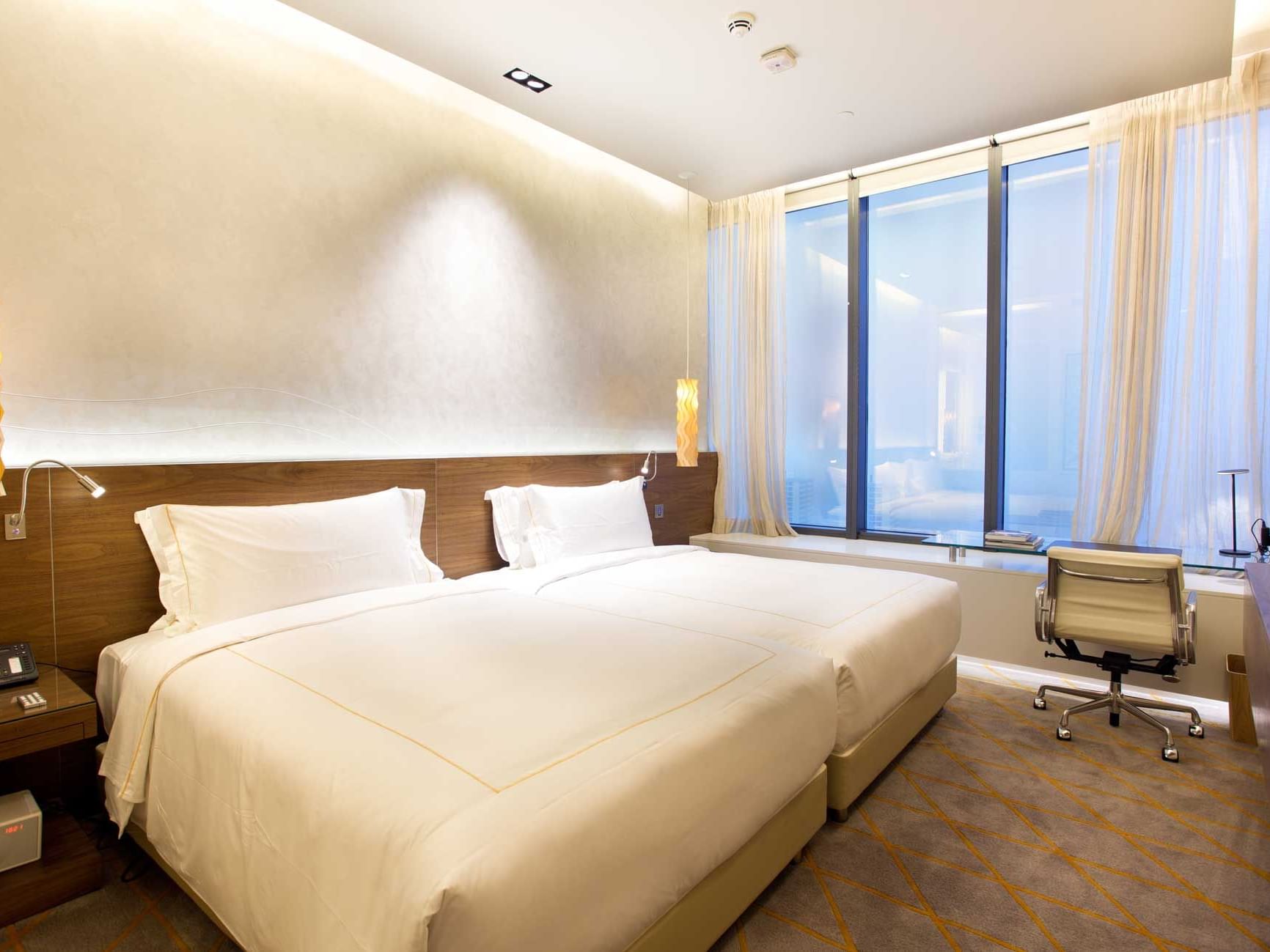 Interior of The Jasmine Villa bedroom at One Farrer Hotel