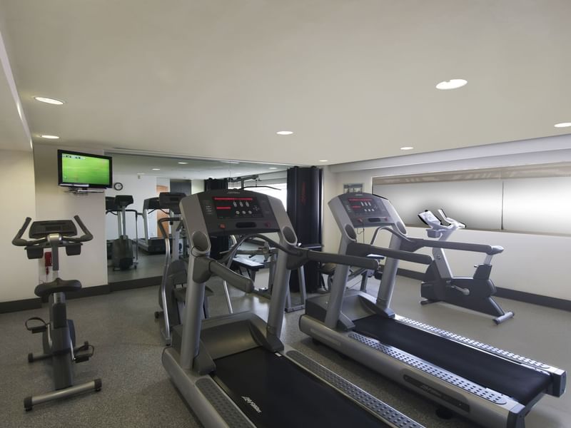 Exercise machines & Tv in Gym Wellness Center at Fiesta Inn