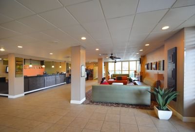 Spacious lobby area & reception by Rosen Inn at Pointe Orlando