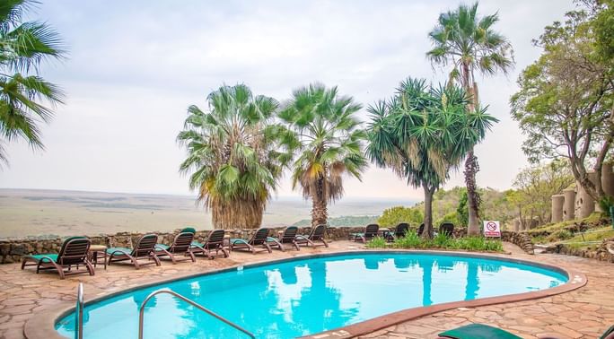 View of a pool along with pool beds at Mara Serena Safari Lodge