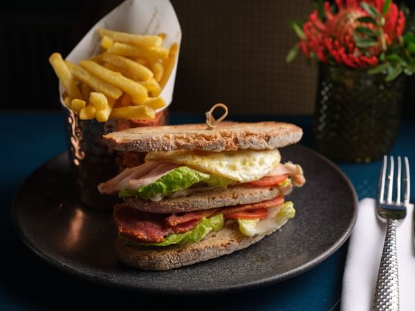 Close-up of Capital Club Sandwich served in the restaurant at The Capital Hotel London