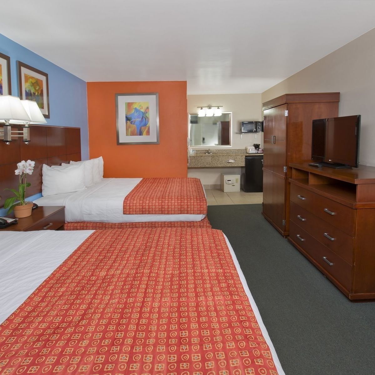 Family Suite with twin Queen beds at Flamingo Waterpark Resort