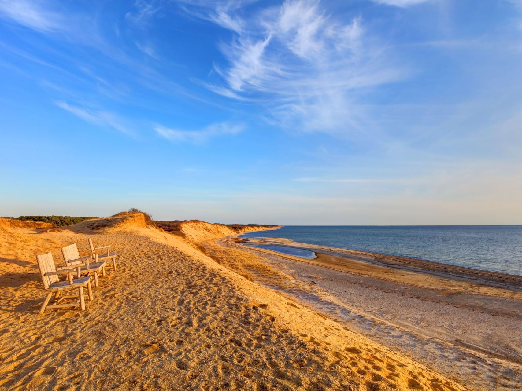 Sun loungers arranged on Cape Cod National Seashore near Chatham Tides Resort