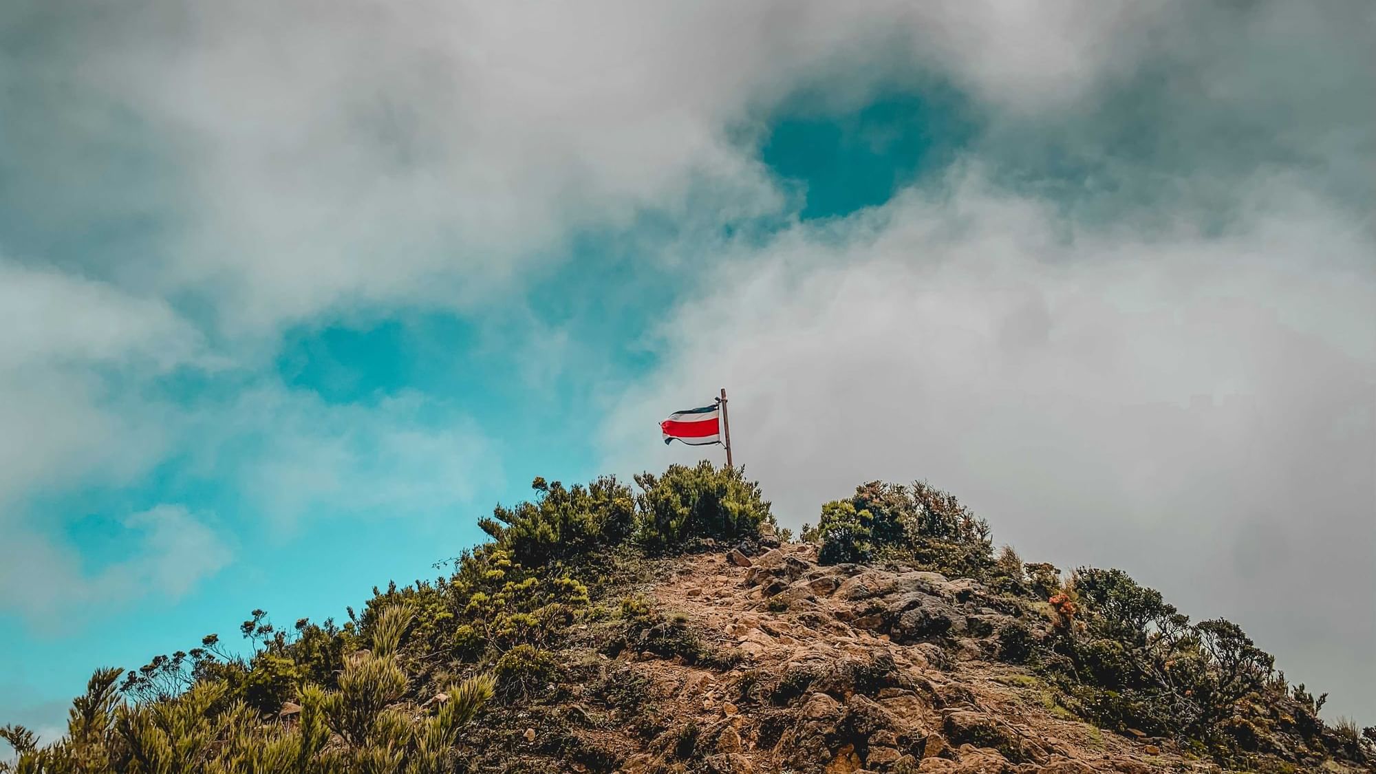 Costa Rica flag on a mountain near Buena Vista Del Rincon