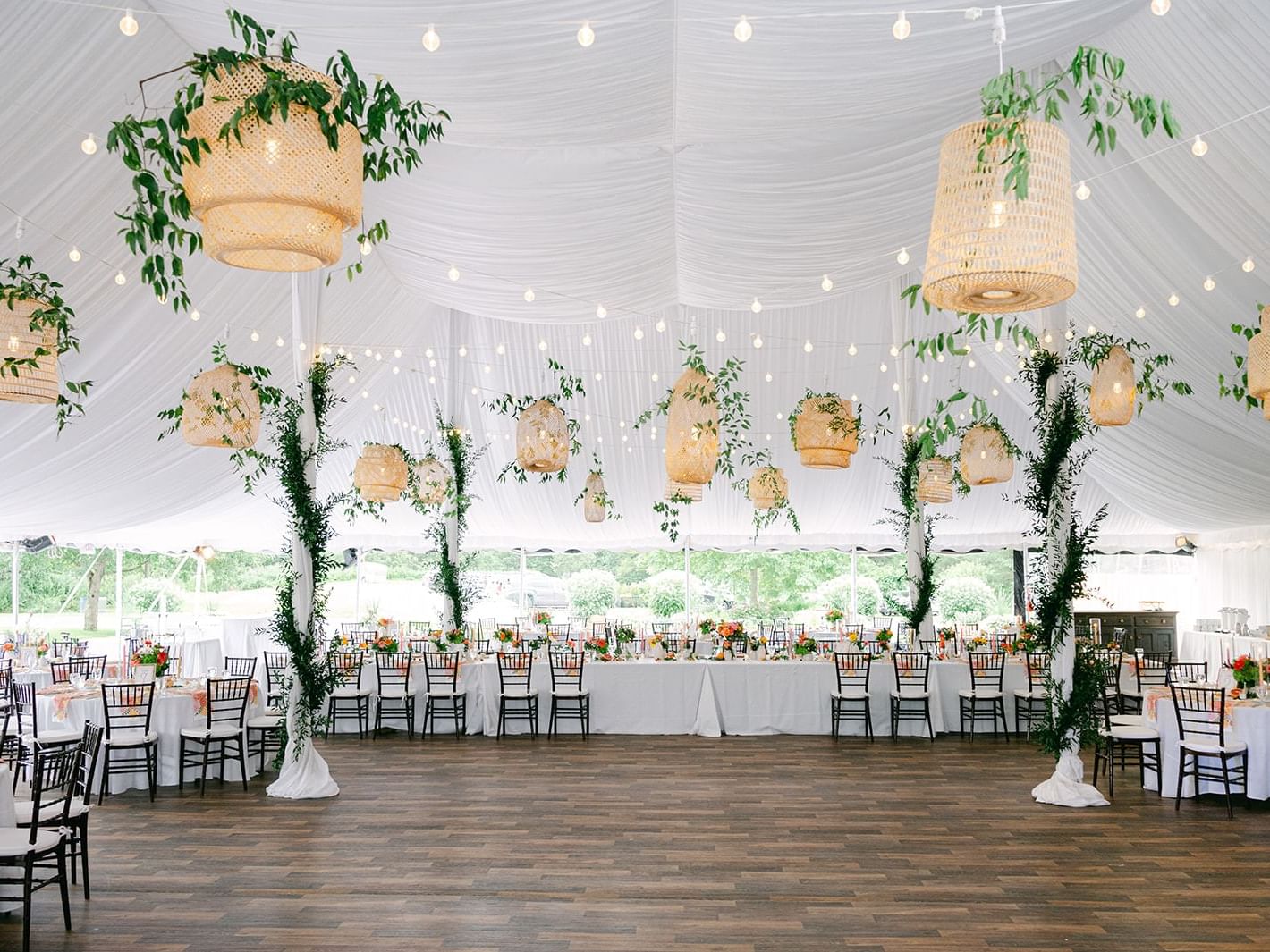 Dining tables arranged in Mountain View Pavilion Tent at Topnotch Stowe Resort