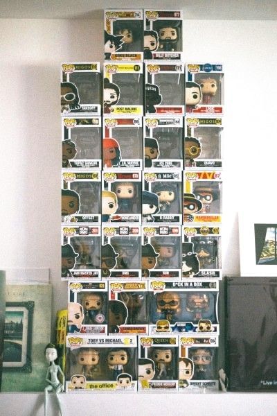 A tall stack of Pop! collectable toys.