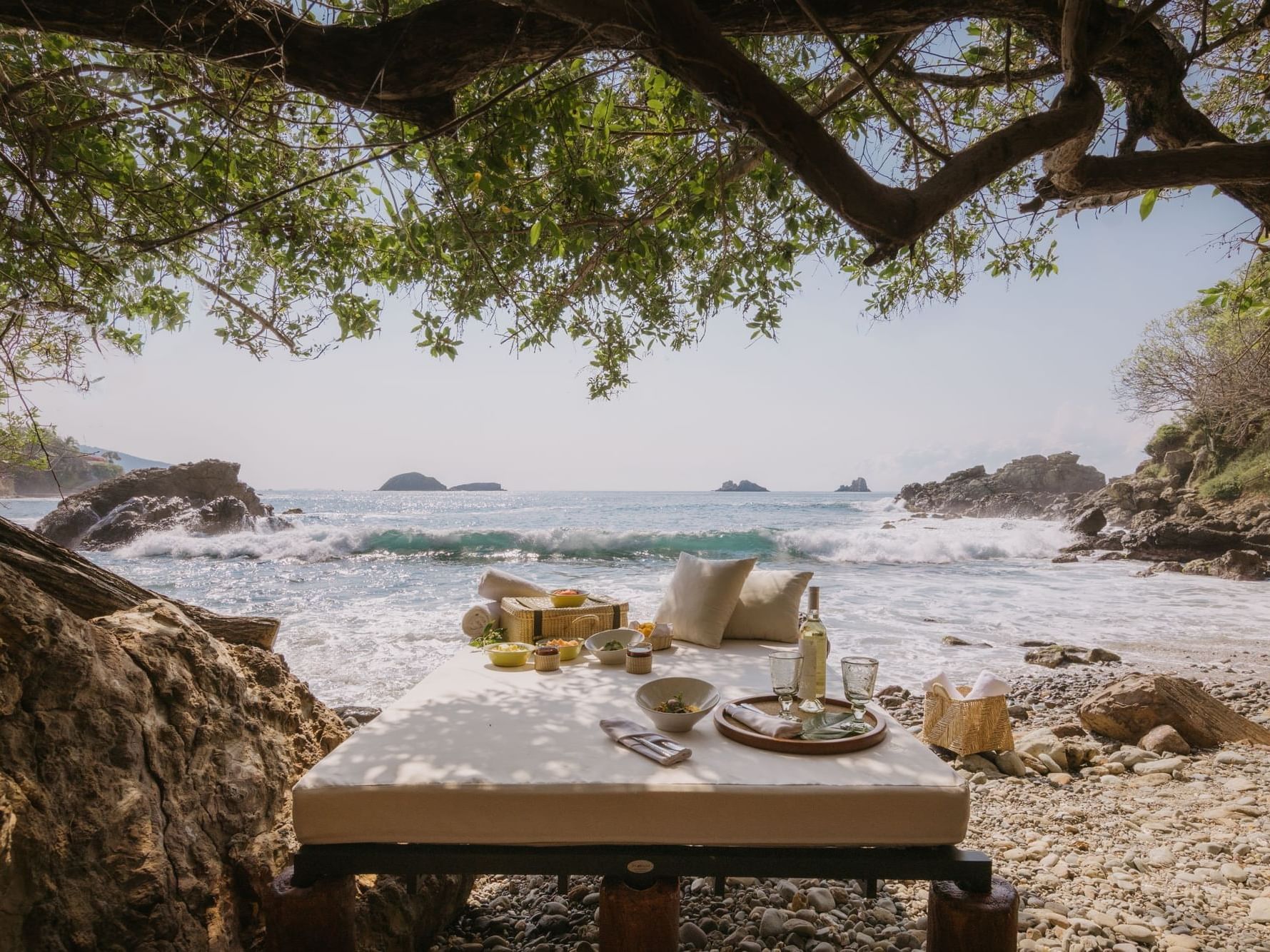 Beach Picnic set-up under a shady tree at Cala de Mar Resort