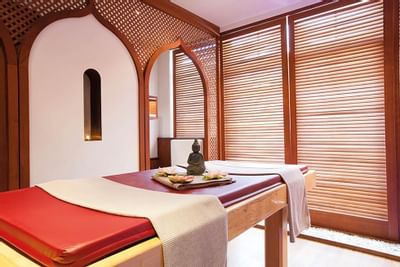 Treatment bed with towels in Ayurveda spa at Liebes Rot Flueh