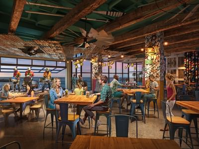 People dining in the Tiki bar at Sunseeker Resort