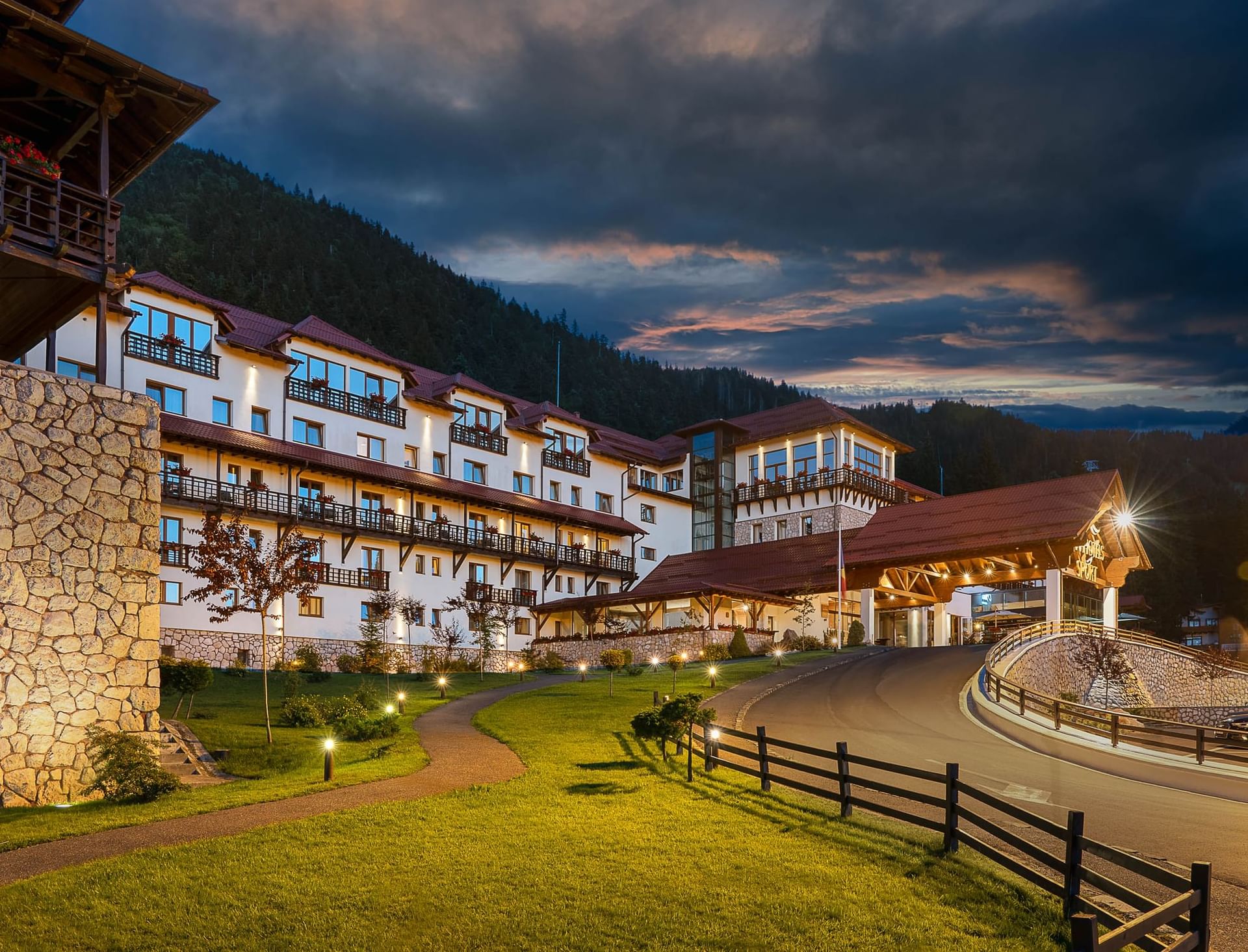 Exterior night view of Ana Hotels Sport Poiana Brașov