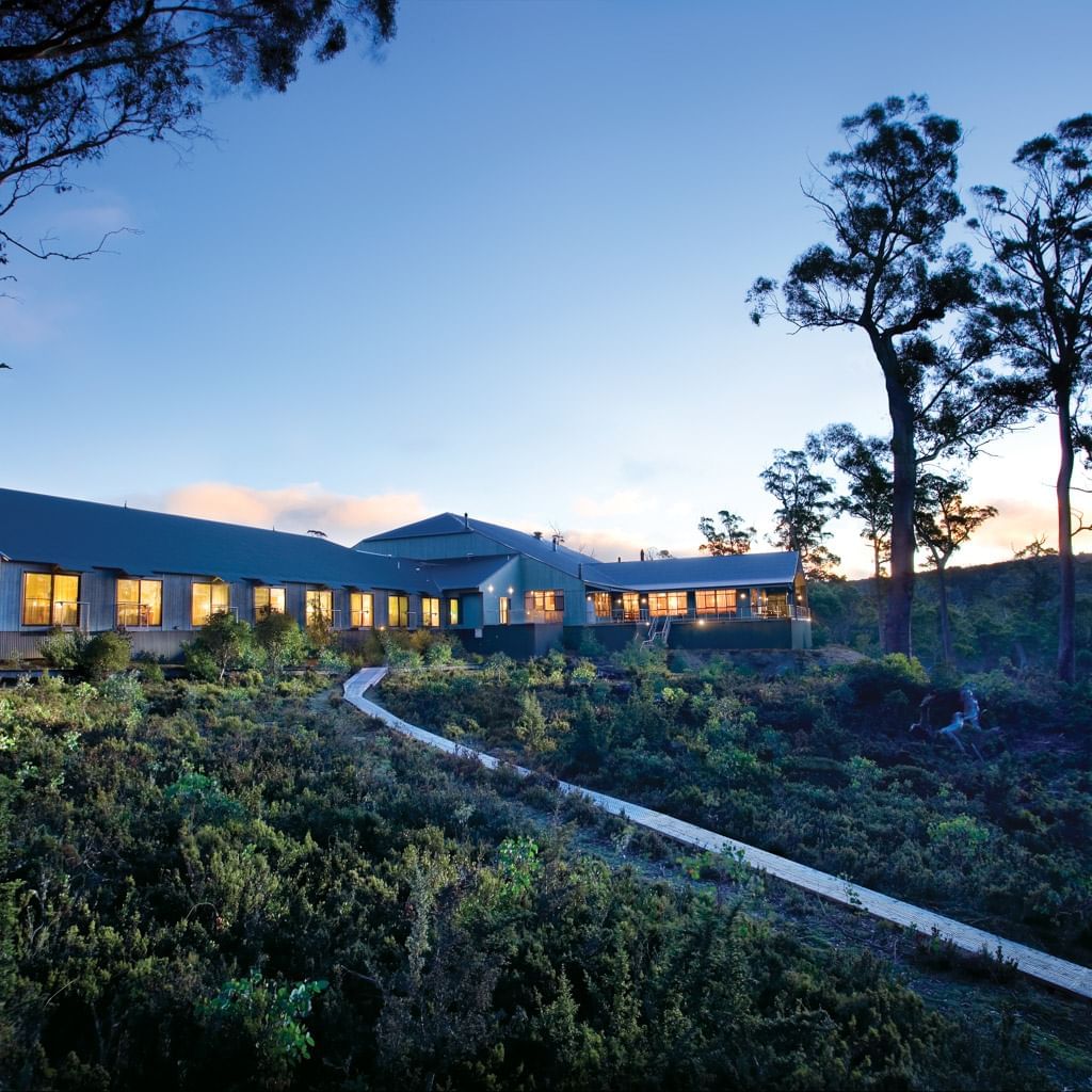 Exterior view of Cradle Mountain Hotel & evening sky