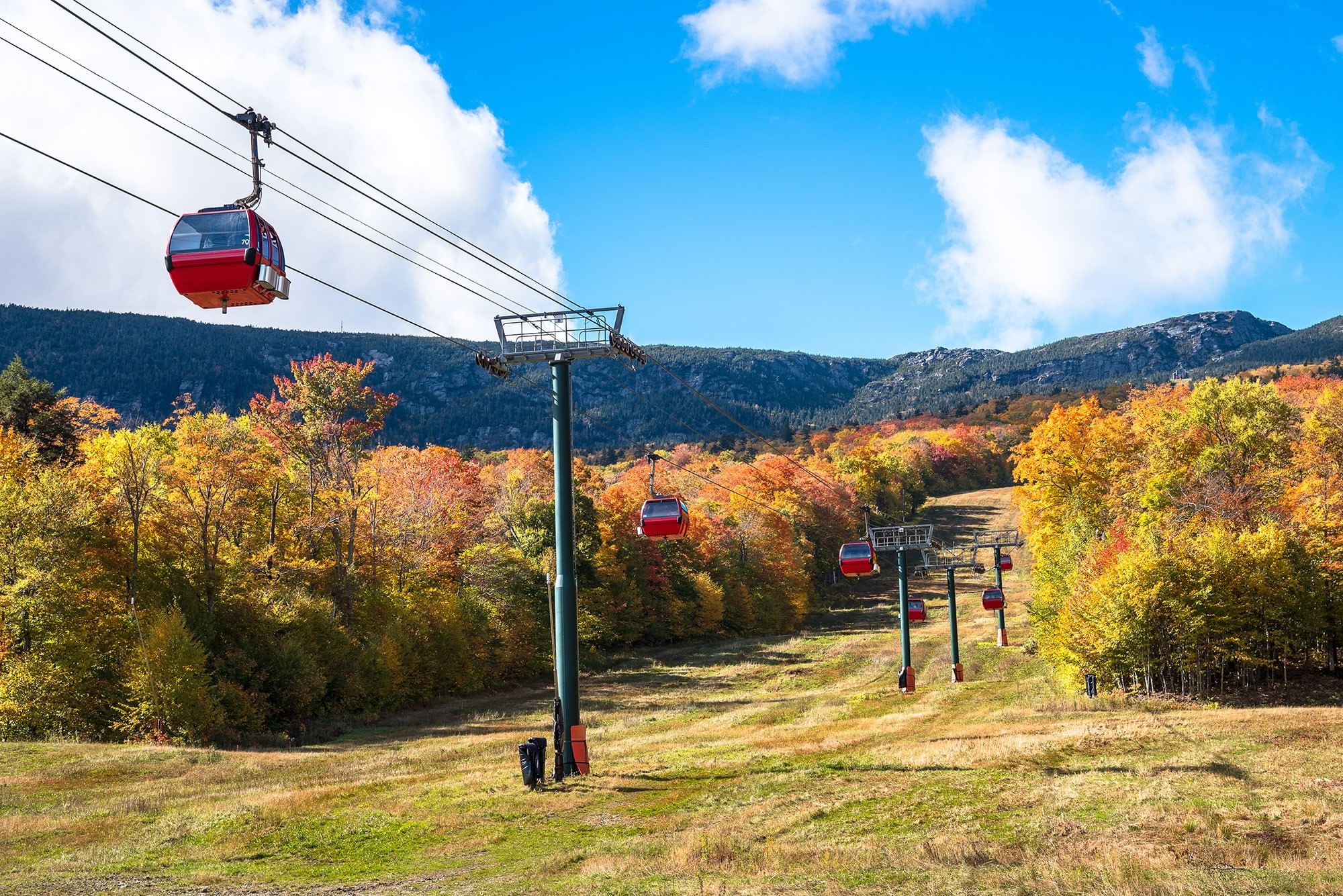 Stowe Mountain Resort cgondola with fall foliage.