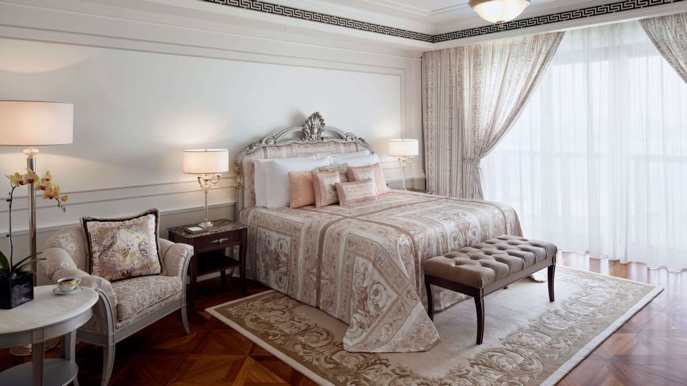 Grand Suite with king bed, table lamps at Palazzo Versace