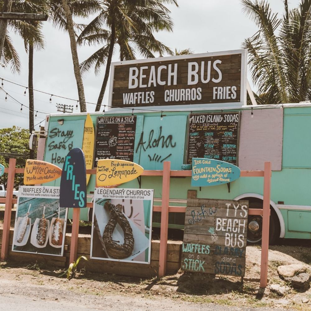 Exterior view of Beach Bus Food truck near Waikiki Resort Hotel by Sono
