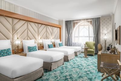 Bedroom area in Executive Quadruple Room at Elaf Al Taqwa