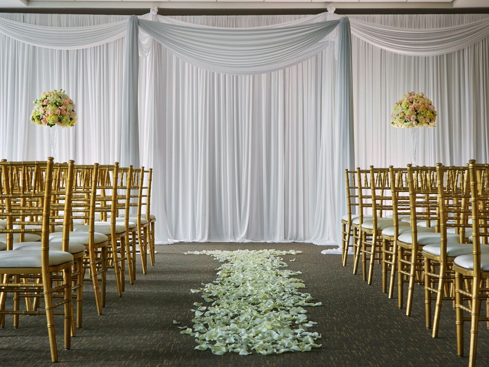 chairs and flowers in a wedding ceremony
