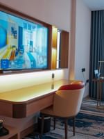 Elegant Premium Club Room interior with desk and chair at Warwick Hotel & Spa Jeddah.