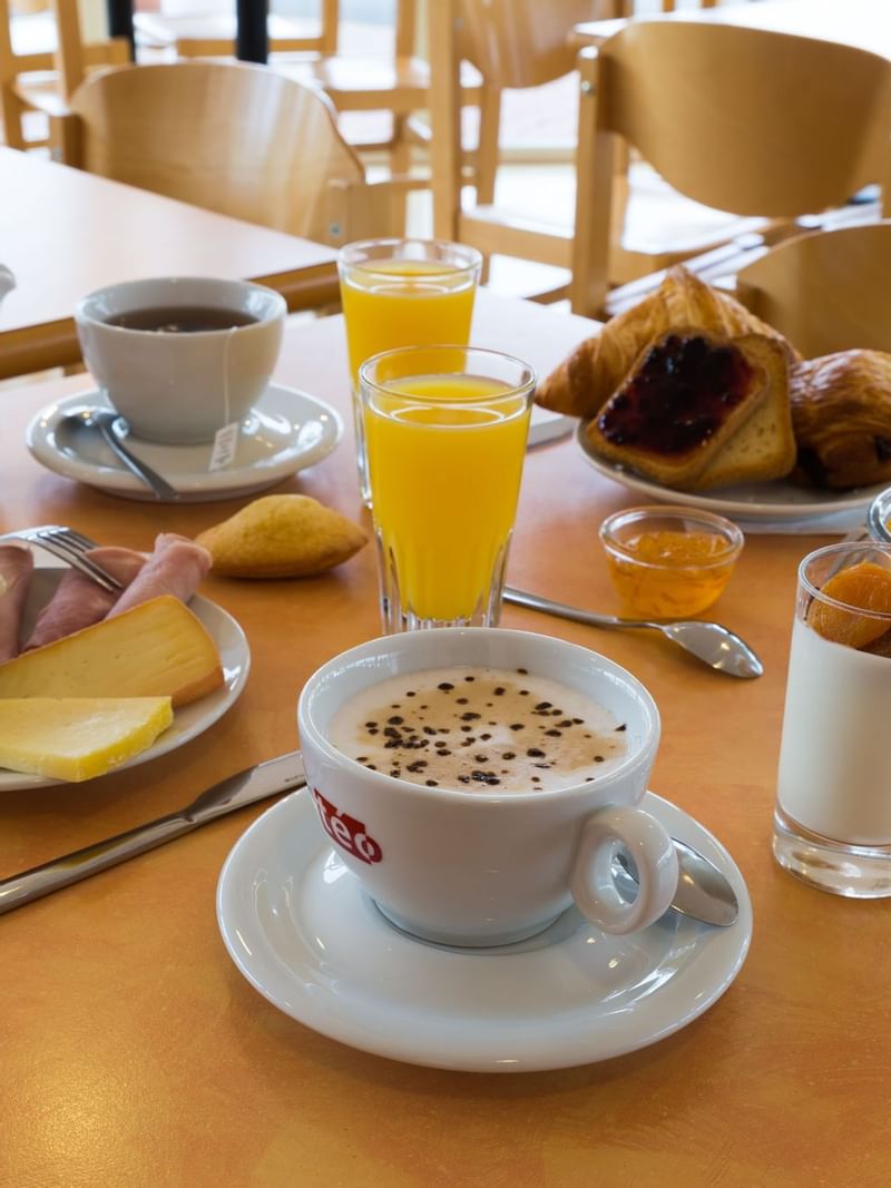 Closeup of breakfast served in a restaurant at Originals Hotels