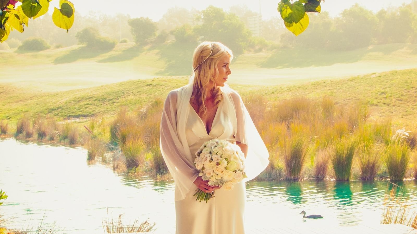 Bride looking at the river at Pullman Magenta Shores