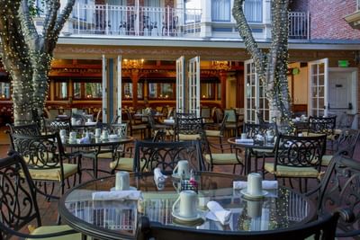 Tables arranged in the courtyard at Horton Grand Hotel