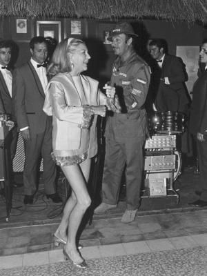Black & white portrait of a lady dancing at Marbella Club