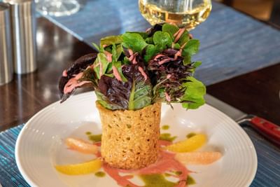 Close-up of a fine dish served at Trianon Bonita Bay
