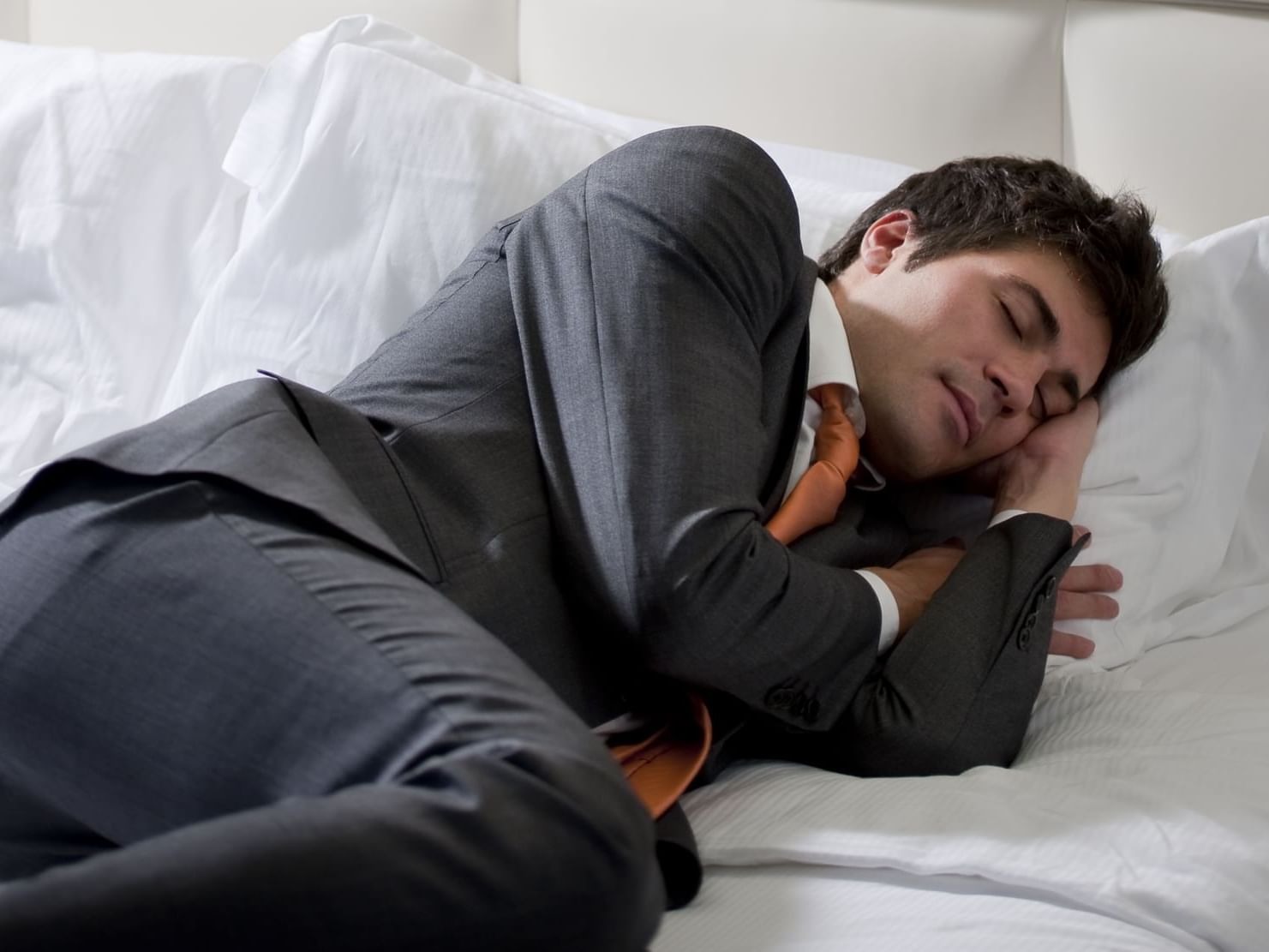 Man sleeping with a suit