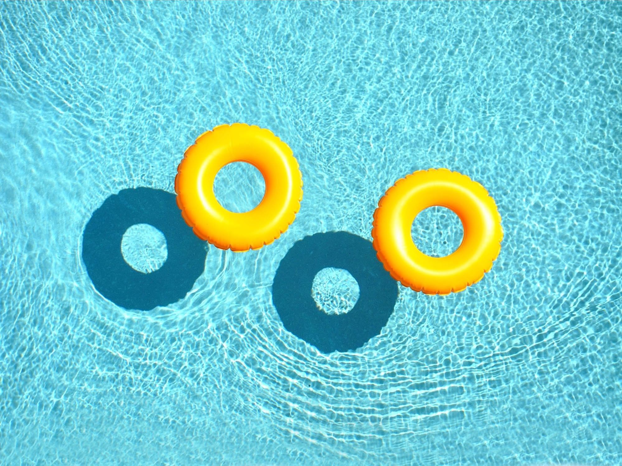 Top view of floats on an outdoor pool at Trianon Bonita Bay