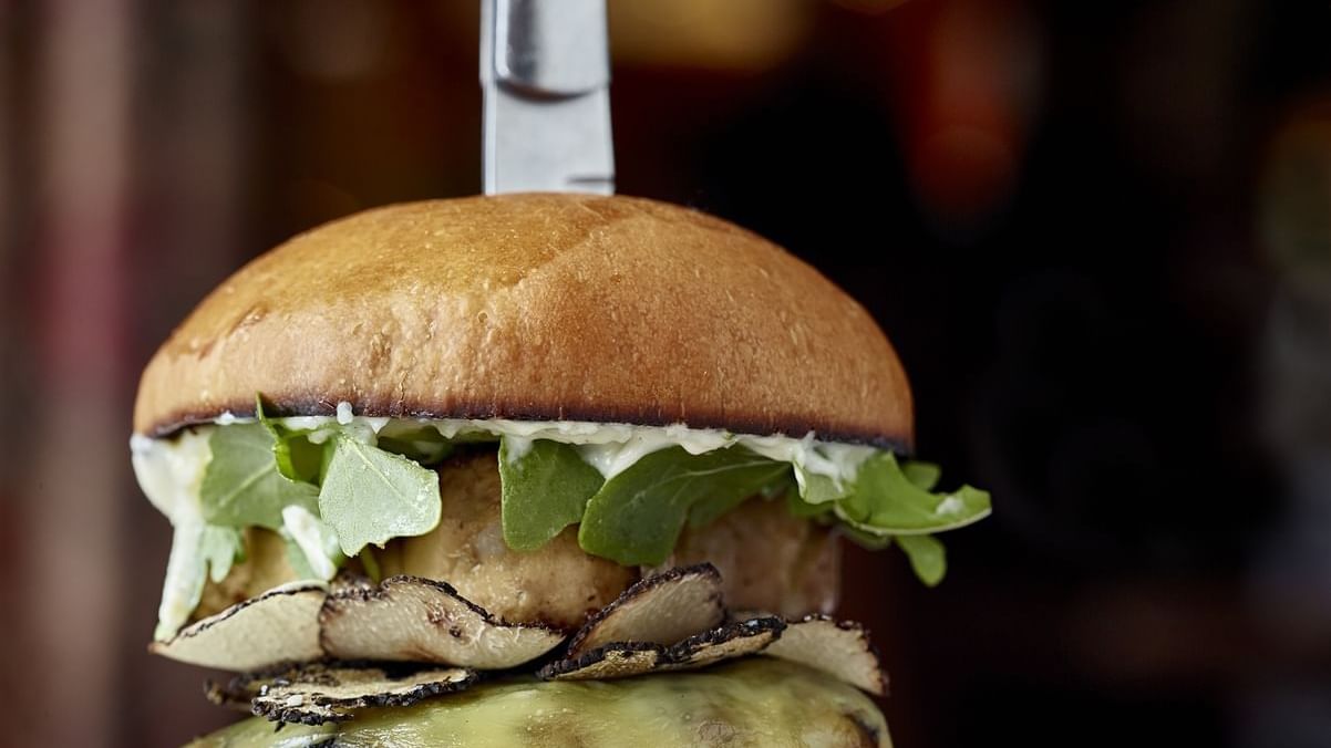 A cheeseburger served in Rugby Grille at The Townsend Hotel