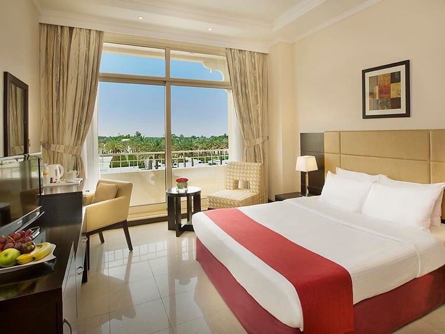 Comfy bed in Deluxe King Room at City Seasons Hotels